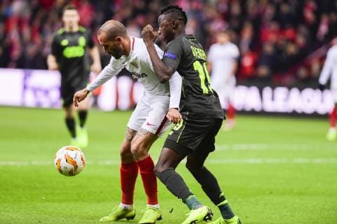Sevilla s Alex Vidal and Standard s Moussa Djenepo fight for the ball during the match between Belgian soccer team Standard de Liege and Spanish club Sevilla, in Liege, Thursday 29 November 2018 on the fifth day of the UEFA Europa League group stage, in group J. LAURIExDIEFFEMBACQ  x05479513x