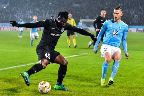 181129 Joseph Aidoo of Genk and Arn?r Ingvi Traustason of Malmö FF during the Europa league match between Malmö FF and Genk on November 29, 2018 in Malmö. Photo: Christian Örnberg BILDBYRN Cop 166  Copyright: ChristianxÖrnberg BB181129CO003