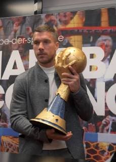 Handball WM 2019 Ambassador Lukas Podolski with cup Press conference Handball is coming home 03 12 2018 Lanxessarena Köln