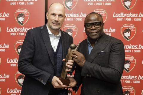 This year s winner Genk s head coach Philippe Clement and Basile Boli pose for the photographer with the trophy at the eighth edition of the Raymond Goethals award, for the coach whose style was the closest to the style of Raymond Goethals, Monday 03 December 2018, in Brussels. THIERRYxROGE  x05481838x