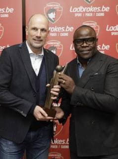 This year s winner Genk s head coach Philippe Clement and Basile Boli pose for the photographer with the trophy at the eighth edition of the Raymond Goethals award, for the coach whose style was the closest to the style of Raymond Goethals, Monday 03 December 2018, in Brussels. THIERRYxROGE  x05481842x