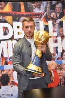 Lukas Podolski Football World Champion and Ambassador of the Handball World Cup 2019 on 03 12 2018 in Cologne at the press conference for the Handball World Cup 2019 in the booth of the German national handball team of the World Cup 2007 The main round matches as well as the Presidents Cup of the Handball World Cup 2019 will be played in Cologne from 19 to 23 January 2019