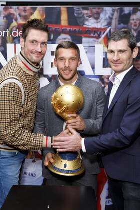 Carsten Lichtlein Lukas Podolski and Henning Fritz at the press conference for the Handball World Cup 2019 Handball Is Coming Home in the 2007 World Cup booth in the Lanxess Arena Cologne 03 12 2018 Foto:xC.xHardtx xFuturexImage