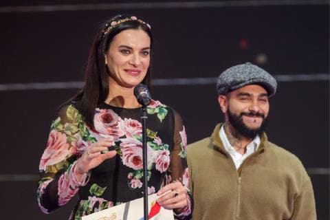 MOSCOW, RUSSIA â€“ DECEMBER 4, 2018: Yelena Isinbayeva (L), two time Olympic pole vault champion and a member of the IOC Athletes Commission, and Russian rapper Timati (Timur Yunusov) at a ceremony to present the 2018 Russian national prize at the office of the Ministry of Sport of Russia. Vladimir Gerdo TASS  TS099CFE