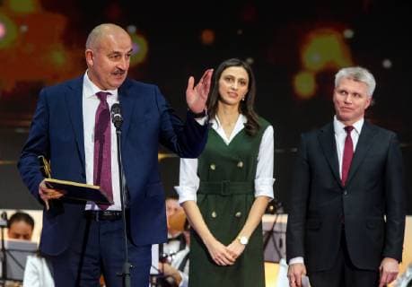 MOSCOW, RUSSIA â€“ DECEMBER 4, 2018: Russian national football team head coach Stanislav Cherchesov, Russian high jumper Maria Lasitskene, and Russia s Minister Pavel Kolobkov (L-R) at a ceremony to present the 2018 Russian national sport prize at the office of the Ministry of Sport of Russia. Vladimir Gerdo TASS  TS099D10