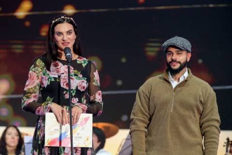 MOSCOW, RUSSIA â€“ DECEMBER 4, 2018: Yelena Isinbayeva (L), two time Olympic pole vault champion and a member of the IOC Athletes Commission, and Russian rapper Timati (Timur Yunusov) at a ceremony to present the 2018 Russian national prize at the office of the Ministry of Sport of Russia. Vladimir Gerdo TASS  TS099D36