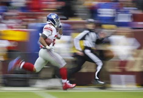 Sport Themen der Woche KW49 Sport Bilder des Tages December 9, 2018: New York Giants RB 26 Saquon Barkley runs for a long touchdown during a NFL American Football Herren USA football game between the Washington Redskins and the New York Giants at FedEx Field in Landover, MD. CSM NFL 2017: Giants vs Redskins DEC 09 - ZUMAc04_ 20181209_zaf_c04_012 Copyright: xJustinxCooperx