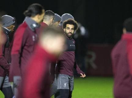 10th December 2018, Melwood, Liverpool, England, UEFA Champions League football, Liverpool versus Napoli,Liverpool training at Melwood ; Mohamed Salah of Liverpool warms up with his team mates at the start of the session  ActionPlus12086621 DavidxBlunsden