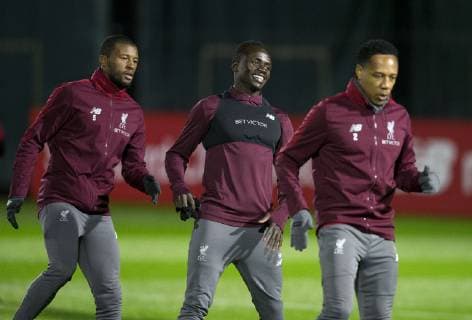 10th December 2018, Melwood, Liverpool, England, UEFA Champions League football, Liverpool versus Napoli,Liverpool training at Melwood ; Georginio Wijnaldum, Sadio Mane and Nathaniel Clyne of Liverpool warm up before the session  ActionPlus12086627 DavidxBlunsden