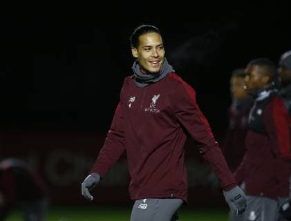 10th December 2018, Melwood, Liverpool, England, UEFA Champions League football, Liverpool versus Napoli press conference PK Pressekonferenz Virgil van Dijk of Liverpool warms up at the club s Melwood training ground ahead of tomorrow s Champions League match against Napoli  ActionPlus12086759 AlanxMartin