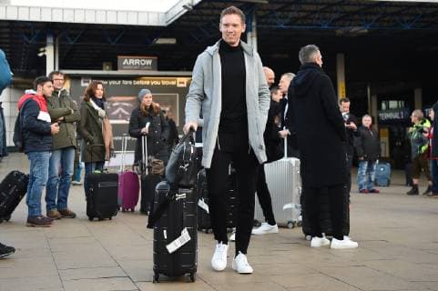 11 12 2018 xmeix Football UEFA Champions League TSG 1899 Hoffenheim Arrival of players at Manchester airport emspor v l Hoffenheim coach Julian Nagelsmann TSG 1899 Hoffenheim DFL DFB REGULATIONS PROHIBIT ANY USE OF PHOTOGRAPHS as IMAGE SEQUENCES and or QUASI VIDEO Manchetser prio:1