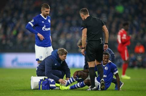 11 12 2018 Football UEFA Champions League 2018 2019 Group stage 6 matchday FC Schalke 04 Locomotive Moscow in the VELTINS Arena Gelsenkirchen Hamza Mendyl mi Schalke sits injured on the ground and must be treated DFL and DFB regulations prohibit any use of photographs as image sequences and or quasi video