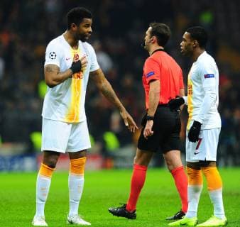 Ryan Donk (L) and Garry Rodrigues (R) of Galatasaray during the Champions League group D match between Galatasaray and Porto at Turk Telkom Stadium n Istanbul , Turkey on December 11 , 2018. 