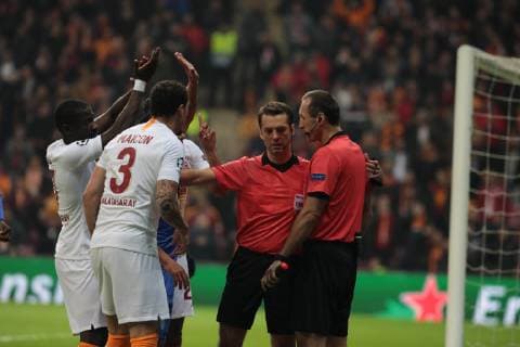 Referee Aleksei Kulbakov and Maicon of Galatasaray during the Champions League group D match between Galatasaray and Porto at Turk Telkom Stadium n Istanbul , Turkey on December 11 , 2018. 