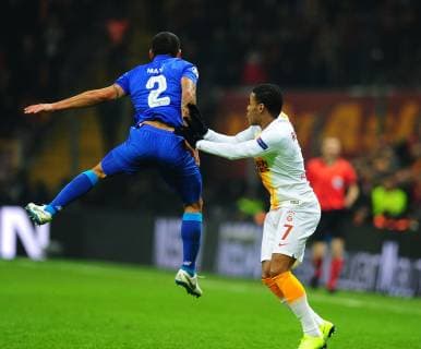 Garry Rodrigues of Galatasaray and Maxi Pereira of Porto during the Champions League group D match between Galatasaray and Porto at Turk Telkom Stadium n Istanbul , Turkey on December 11 , 2018. 