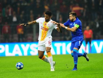 Ryan Donk (L) of Galatasaray and Hernani of Porto during the Champions League group D match between Galatasaray and Porto at Turk Telkom Stadium n Istanbul , Turkey on December 11 , 2018. 