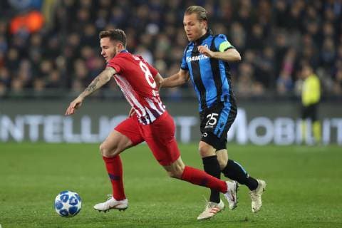 Atletico s Saul Niguez Esclapez and Club s Ruud Vormer fight for the ball during a game between Belgian soccer team Club Brugge KV and Spanish club Athletico Madrid, in Brugge, Tuesday 11 December 2018, on the sixth and last day of the UEFA Champions League, in the group A. BRUNOxFAHY  x05488097x