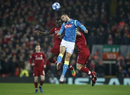 Sadio Mane of Liverpool challenges Nikola Maksimovic of Napoli during the UEFA Champions League Group C match at Anfield Stadium, Liverpool. Picture date 11th December 2018. Picture credit should read: Andrew Yates Sportimage EDITORIAL USE ONLY. No use with unauthorised audio, video, data, fixture lists, club league logos or live services. Online in-match use limited to 120 images, no video emulation. No use in betting, games or single club league player publications. _AY20249.JPG