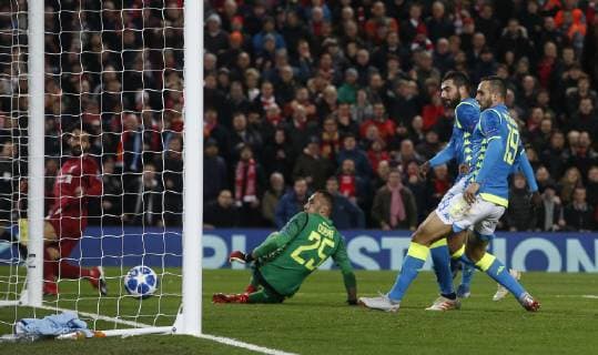 Mohamed Salah of Liverpool scores the first goal past David Ospina of Napoli during the UEFA Champions League Group C match at Anfield Stadium, Liverpool. Picture date 11th December 2018. Picture credit should read: Andrew Yates Sportimage EDITORIAL USE ONLY. No use with unauthorised audio, video, data, fixture lists, club league logos or live services. Online in-match use limited to 120 images, no video emulation. No use in betting, games or single club league player publications. _AY19140.JPG