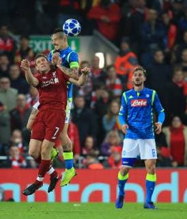 11th December 2018, Anfield, Liverpool, England; UEFA Champions League football, Liverpool versus Napoli; James Milner of Liverpool and Jose Callejon of Napoli compete for the header  ActionPlus12086823 DavidxBlunsden
