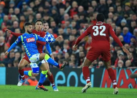 11th December 2018, Anfield, Liverpool, England; UEFA Champions League football, Liverpool versus Napoli; Lorenzo Insigne of Napoli brings the ball under control challenged by Trent Alexander-Arnold of Liverpool  ActionPlus12086827 DavidxBlunsden