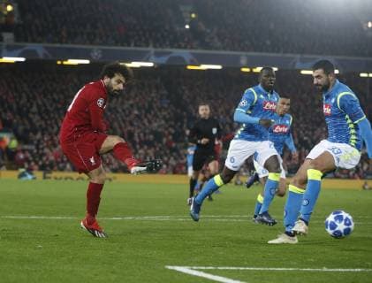 Mohamed Salah of Liverpool takes ascot on goal during the UEFA Champions League Group C match at Anfield Stadium, Liverpool. Picture date 11th December 2018. Picture credit should read: Andrew Yates Sportimage EDITORIAL USE ONLY. No use with unauthorised audio, video, data, fixture lists, club league logos or live services. Online in-match use limited to 120 images, no video emulation. No use in betting, games or single club league player publications. _AY19164.JPG