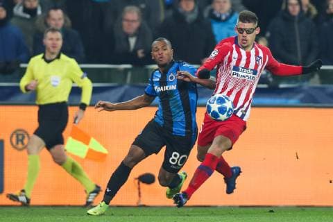 Club s Lois Openda and Atletico s Francisco Montero fight for the ball during a game between Belgian soccer team Club Brugge KV and Spanish club Athletico Madrid, in Brugge, Tuesday 11 December 2018, on the sixth and last day of the UEFA Champions League, in the group A. BRUNOxFAHY  x05488206x