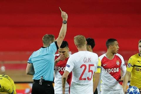 Referee Craig Pawson England shows Mahmoud Dahoud face-down Dortmund the yellow card at AS Monaco vs Borussia Dortmund Football Champions League 11 12 2018 AS Monaco vs Borussia Dortmund Football Champions League 11 12 2018 Monaco Copyright: xEIBNER MarioxHommesx EP_MHS