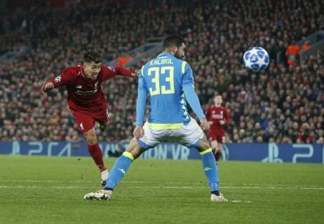 Roberto Firmino of Liverpool takes a chance on goal during the UEFA Champions League Group C match at Anfield Stadium, Liverpool. Picture date 11th December 2018. Picture credit should read: Andrew Yates Sportimage EDITORIAL USE ONLY. No use with unauthorised audio, video, data, fixture lists, club league logos or live services. Online in-match use limited to 120 images, no video emulation. No use in betting, games or single club league player publications. _AY19191.JPG