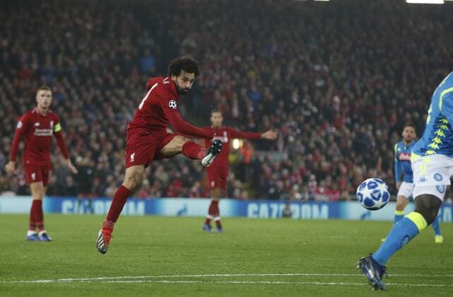 Sport Bilder des Tages Mohamed Salah of Liverpool shoots during the UEFA Champions League Group C match at Anfield Stadium, Liverpool. Picture date 11th December 2018. Picture credit should read: Andrew Yates Sportimage EDITORIAL USE ONLY. No use with unauthorised audio, video, data, fixture lists, club league logos or live services. Online in-match use limited to 120 images, no video emulation. No use in betting, games or single club league player publications. _AY19185.JPG