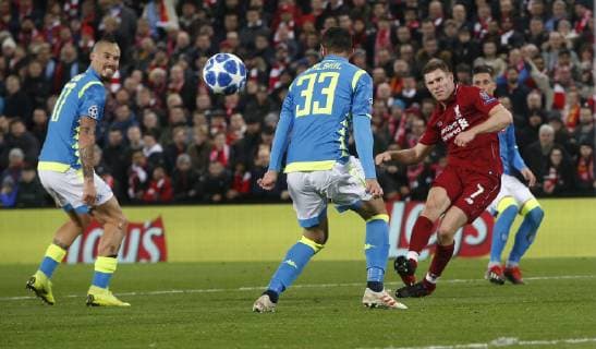 James Milner of Liverpool attempts to curl a shot inside the post during the UEFA Champions League Group C match at Anfield Stadium, Liverpool. Picture date 11th December 2018. Picture credit should read: Andrew Yates Sportimage EDITORIAL USE ONLY. No use with unauthorised audio, video, data, fixture lists, club league logos or live services. Online in-match use limited to 120 images, no video emulation. No use in betting, games or single club league player publications. _AY19203.JPG