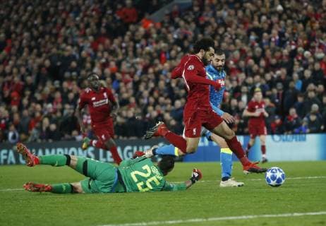 Mohamed Salah of Liverpool goes past David Ospina of Napoli but fails to score during the UEFA Champions League Group C match at Anfield Stadium, Liverpool. Picture date 11th December 2018. Picture credit should read: Andrew Yates Sportimage EDITORIAL USE ONLY. No use with unauthorised audio, video, data, fixture lists, club league logos or live services. Online in-match use limited to 120 images, no video emulation. No use in betting, games or single club league player publications. _AY19214.JPG