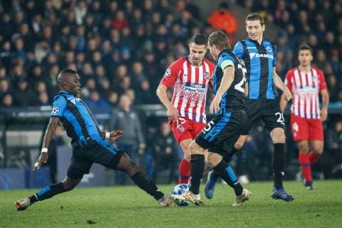 Atletico s Vitolo and Club s Ruud Vormer fight for the ball during a game between Belgian soccer team Club Brugge KV and Spanish club Athletico Madrid, in Brugge, Tuesday 11 December 2018, on the sixth and last day of the UEFA Champions League, in the group A. KURTxDESPLENTER  x05488234x