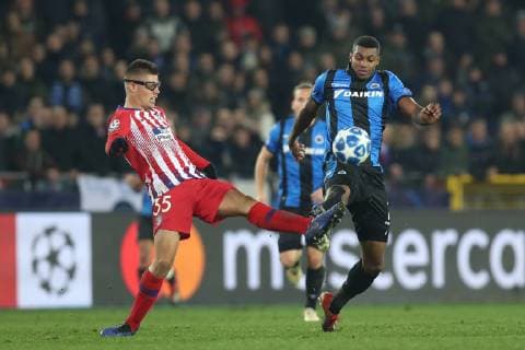 Atletico s Francisco Montero and Club s Wesley Moraes fight for the ball during a game between Belgian soccer team Club Brugge KV and Spanish club Athletico Madrid, in Brugge, Tuesday 11 December 2018, on the sixth and last day of the UEFA Champions League, in the group A. BRUNOxFAHY  x05488264x
