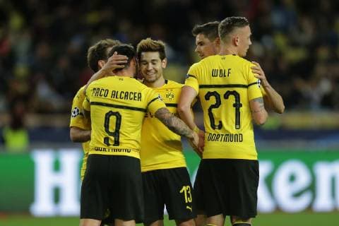 v l Paco Alcacer Dortmund Raphael Guerreiro Dortmund Julian Weigl Dortmund and Marius Wolf Dortmund cheer after Raphael Guerreiro Dortmund scored the 0 2 goal at AS Monaco vs Borussia Dortmund Football Champions League 11 12 2018 AS Monaco vs Borussia Dortmund Football Champions League 11 12 2018 Monaco Copyright: xEIBNER MarioxHommesx EP_MHS