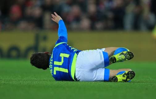 11th December 2018, Anfield, Liverpool, England; UEFA Champions League football, Liverpool versus Napoli; Dries Mertens of Napoli rolls on the turf after being brought down by Virgil van Dijk of Liverpool  ActionPlus12086854 DavidxBlunsden