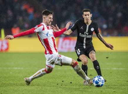 11th December 2018, Rajko Mitic Stadium, Belgrade, Serbia; UEFA Champions League football, Red Star Belgrade versus Paris Saint-Germain; Angel Di Maria of Paris Saint-Germain takes on Milos Degenek of Red Star Belgrade  ActionPlus12086916 NikolaxKrstic