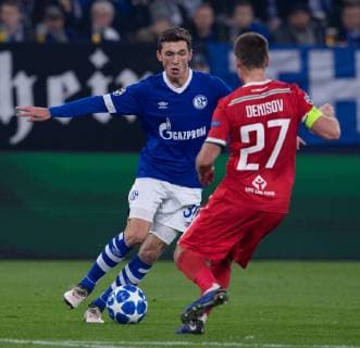 Football Champions League Group Phase 6 Matchday FC Schalke 04 Locomotive Moscow on 11 12 2018 in the Veltins Arena in Gelsenkirchen Benjamin Goller Schalke left Igor Denisov Moscow right DFL Regulations prohibit any use of photographs as image sequences and or quasi video xMNx