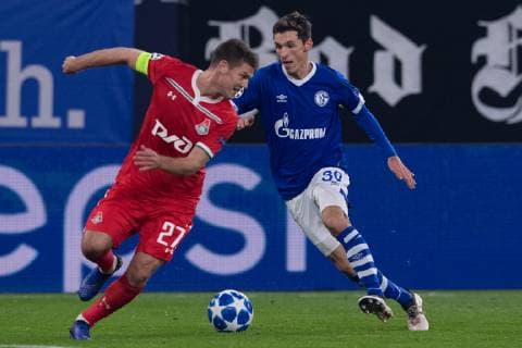 Football Champions League Group Phase 6 Matchday FC Schalke 04 Locomotive Moscow on 11 12 2018 in the Veltins Arena in Gelsenkirchen Benjamin Goller Schalke right Igor Denisov Moscow left DFL Regulations prohibit any use of photographs as image sequences and or quasi video xMNx