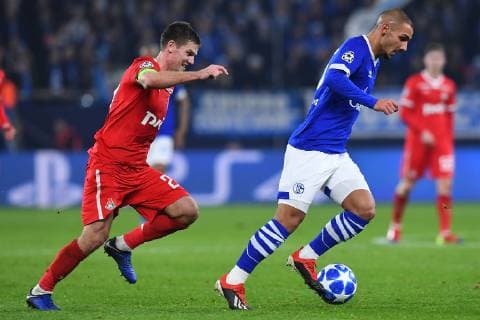 Football Champions League Group Phase 6 Matchday FC Schalke 04 Locomotive Moscow on 11 12 2018 in the Veltins Arena in Gelsenkirchen Igor Denisov Moscow left Ahmed Kutucu Schalke right DFL Regulations prohibit any use of photographs as image sequences and or quasi video xRx