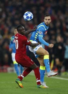 Football - 2018 2019 UEFA Champions League - Group C: Liverpool vs. Napoli Sadio Mane of Liverpool and Nikola Maksimovic of SSC Napoli at Anfield. COLORSPORT LYNNE CAMERON 