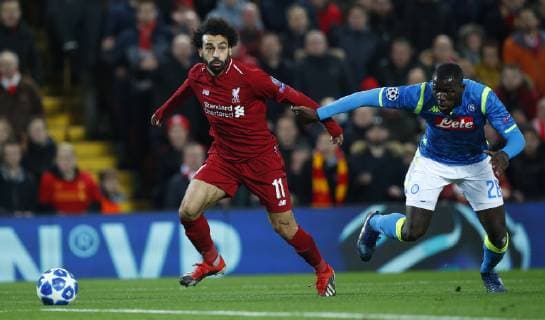 Football - 2018 2019 UEFA Champions League - Group C: Liverpool vs. Napoli Mohamed Salah of Liverpool and Kalidou Albiol of SSC Napoli at Anfield. COLORSPORT LYNNE CAMERON 