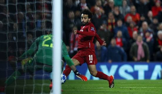 Football - 2018 2019 UEFA Champions League - Group C: Liverpool vs. Napoli Mohamed Salah of Liverpool scores at Anfield. COLORSPORT LYNNE CAMERON 