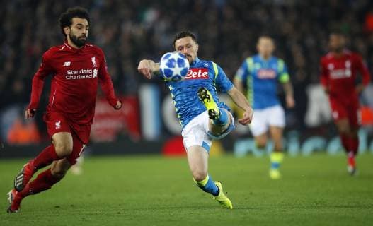 Football - 2018 2019 UEFA Champions League - Group C: Liverpool vs. Napoli Mohamed Salah of Liverpool and Fabian Ruiz of SSC Napoli at Anfield. COLORSPORT LYNNE CAMERON 
