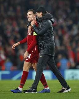 Football - 2018 2019 UEFA Champions League - Group C: Liverpool vs. Napoli Jordan Henderson and Jurgen Klopp manager of Liverpool celebrate after winning at Anfield. COLORSPORT LYNNE CAMERON 