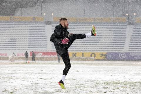 A player of FK Jablonec warms up on the pitch as it is snowing during an open training session, Kyiv, capital of Ukraine, December 12, 2018. Ukrinform. Jablonec?s training session in Kyiv  Copyright: xHennadiixMinchenkox
