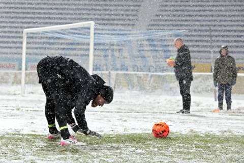 Goalkeeper Vlastimil Hruby of FK Jablonec stretches on the pitch as it is snowing during an open training session, Kyiv, capital of Ukraine, December 12, 2018. Ukrinform. Jablonec?s training session in Kyiv  Copyright: xHennadiixMinchenkox