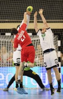Photo Defense of Patrick Wiencek Germany against Adrian Kondratiuk Handball International match in Rostock at Mi 12 12 2018 Germany Poland