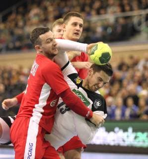 Photo Hendrik Pekeler Germany throws against Przemyslav Krajewski international handball match in Rostock on Wed 12 12 2018 Germany Poland