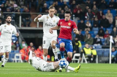 Real Madrid Marcos Llorente and Federico Valverde and PFC CSKA Moskva Kristijan Bistrovic during UEFA Champions League match between Real Madrid and PFC CSKA Moskva at Santiago Bernabeu Stadium in Madrid, Spain. December 12, 2018.  (0016013)
